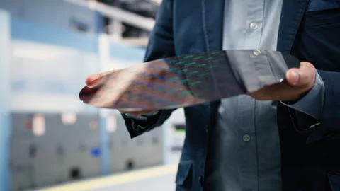 Carrying semiconductor substrates, hardware close up Stock Footage 333394827