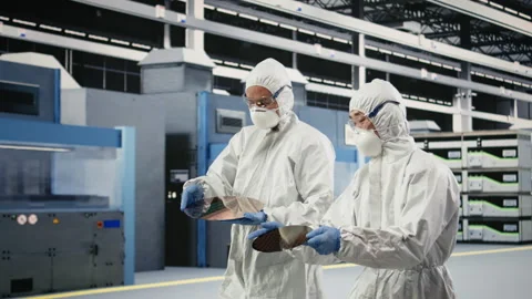 Carrying silicon wafer, engineering and multiethnic team coworkers Stock Footage 333393811