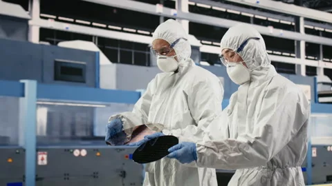 Carrying silicon wafer, engineering and multiethnic team coworkers Stock Footage 333395507