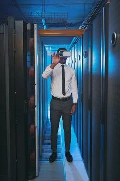 Carrying technology into the future. Full length shot of a young IT specialist 写真素材