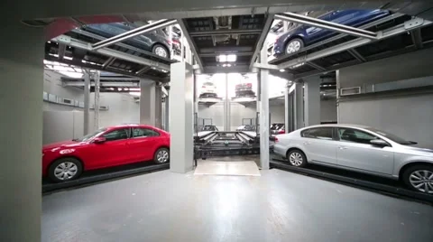 Cars and empty elevator in tower for storage and presentation Stockbeeldmateriaal 40065730