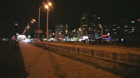 Cars and a traffic light in the evening. Timelapse Stock Footage