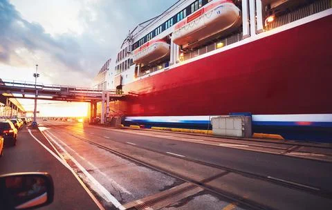 Cars are waiting in a queue for loading onboard of big ferry ship, cruise lin Stock Photos
