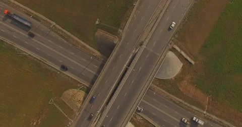 A Cars at complex interchange and highway Stock Footage 55873775