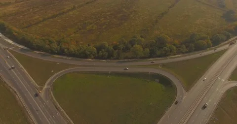 A Cars at complex interchange and highway Stock Footage 55874847