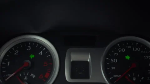 The cars dashboard control panel illuminates with hazard warning lights flas Stock Footage 331362724