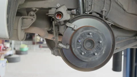 Car's disc break without the break shoes Stock Footage 239741022