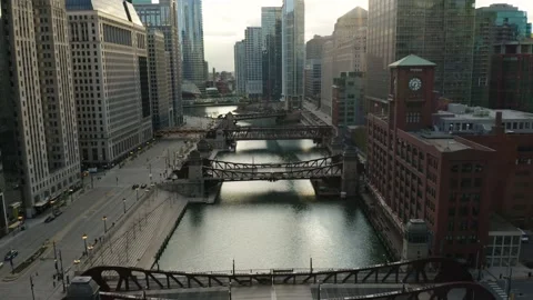 Cars Drive on Upper Wacker Drive along Chicago River during COVID-19, Aerial Stock Footage 130401652