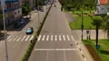 Cars driving along highway in Batumi, aerial downtown cityscape, traffic rules HD Footage
