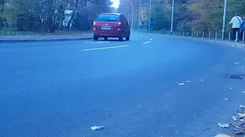 Cars driving down the road Stock-Footage 82296994