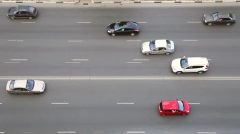 Cars driving on a multilane road Stock Footage 64569355