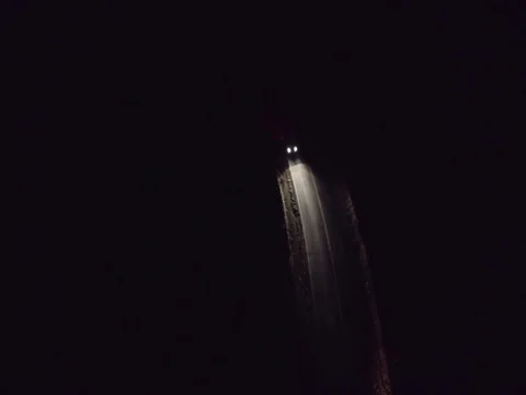 Cars Driving At Night Through Desert Pass Stock Footage