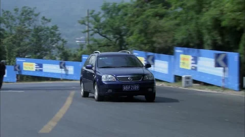 Cars driving on switchbacks Stock Footage 235279507