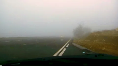 Cars driving through the fog Stock-Footage 59596086