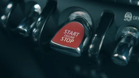 Car's engine is getting started with a button getting pressed Stock Footage 120526152