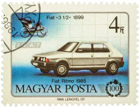 Cars Fiat 3 1/2 (1899) and Fiat Ritmo (1985) on postage stamp Stock Photos