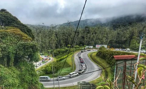 Cars flocking on the uphill road at Cameron Highlands Malaysia. Stock Photos