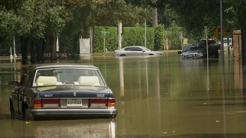 Cars in flooded water after Hurricane Harvey hits Houston Stock Footage