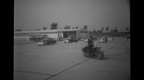 Cars following in a row on concrete ground Stock Footage