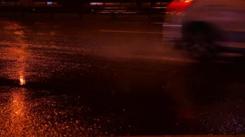 Cars go in the rain time lapse Stock Footage