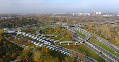 Cars Go Through The Highway Intersection. Aerial, Panorama, Time Lapse Stock Footage 97863541