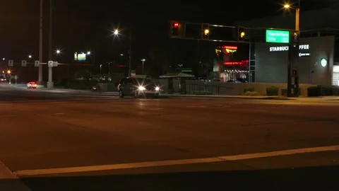 Cars at Intersection at Night Timelapse Video stock 202053873