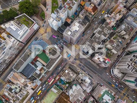 Cars with intersection streets in Sham Shui Po district. Architecture and tra Stock Photos