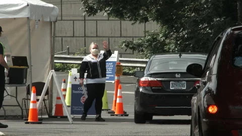 Cars Line Up For COVID19 Testing Stock Footage 133015482