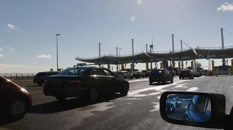 Cars lining up at Customs at Eurotunnel Stock Footage