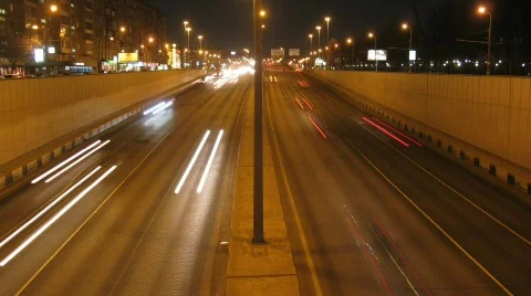 Cars moving on road in night, time lapse Stock Footage