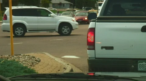 Cars moving through intersection Stock-Footage 108737