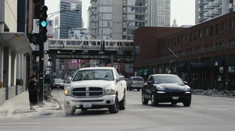 Cars moving through the Intersection Stock Footage 56628296