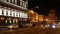 Cars near building with night illumination in Kiev, Ukraine HD Footage