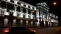 Cars near building with night illumination HD Footage