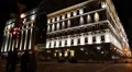 Cars near building with night illumination in Kiev, Ukraine HD Footage