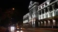 Cars near building with night illumination HD Footage