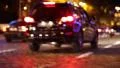 Cars in night city, defocused and with stereo sound HD Footage