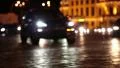 Cars in night city, defocused and with stereo sound HD Footage