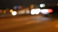 Cars in night city, defocused and with stereo sound HD Footage