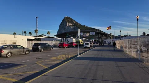 Cars passing border control checkpoint entering Gibraltar, United Kingdom - Stock Footage 307172553