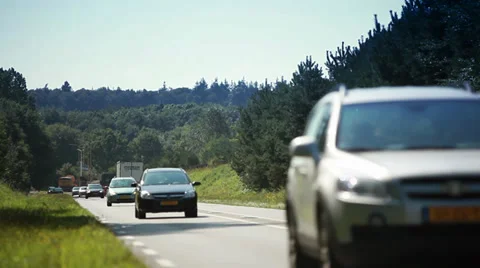 Cars passing by Stock Footage 39018301