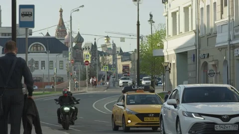 Cars, people and motorbike in Moscow city in slow motion. Stock Footage