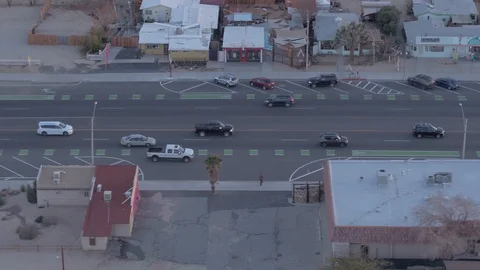 Cars pulling up to Intersection in Joshua Tree. Video stock 85643084