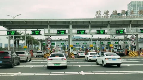 Cars Queue at Macau Border Crossing on Cloudy Day for International Travel Stock Footage 320160847
