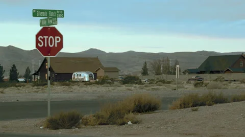 Cars Speeding Past An Intersection Video stock 36094813