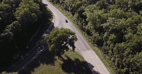 Cars Splitting at Intersection Stock Footage 90766204