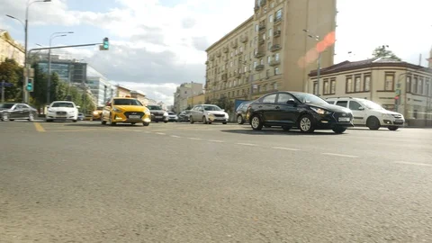 Cars start driving at the intersection of the Garden Ring in Moscow and Staraya Stock Footage 120581739