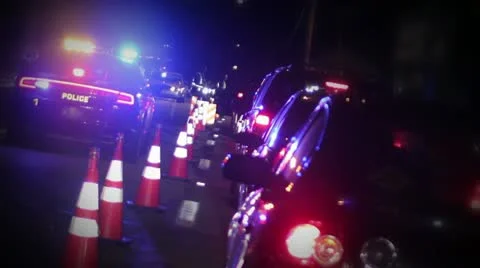 Cars Stopped in Line at a Police DUI Sobriety Checkpoint Stock Footage