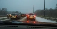 Cars Stuck On Highway In Rush Hour Traffic In The Snow Stock Footage