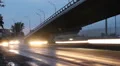 Cars timelapse, city road junction bridge, street light turn on HD Footage